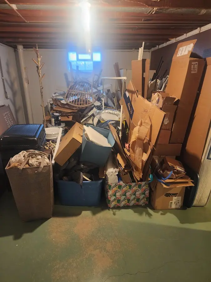 Roll-off dumpster container at job site for Yard Waste Dumpster Rental in Glens Falls